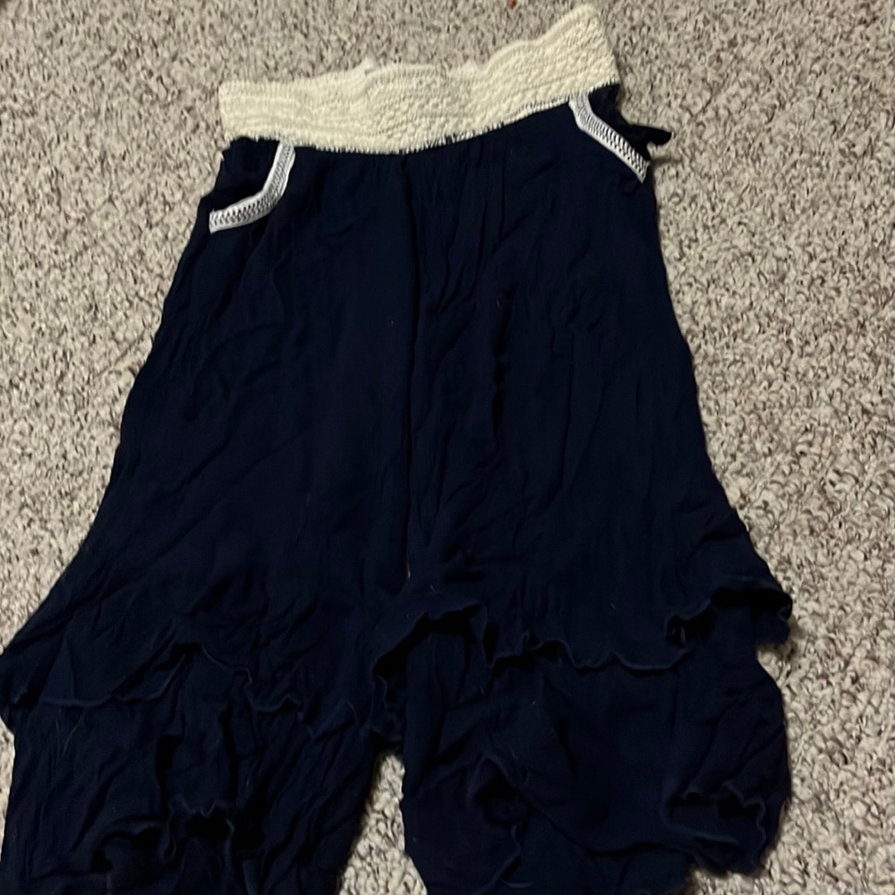 navy blue flared ruffled ankle pants